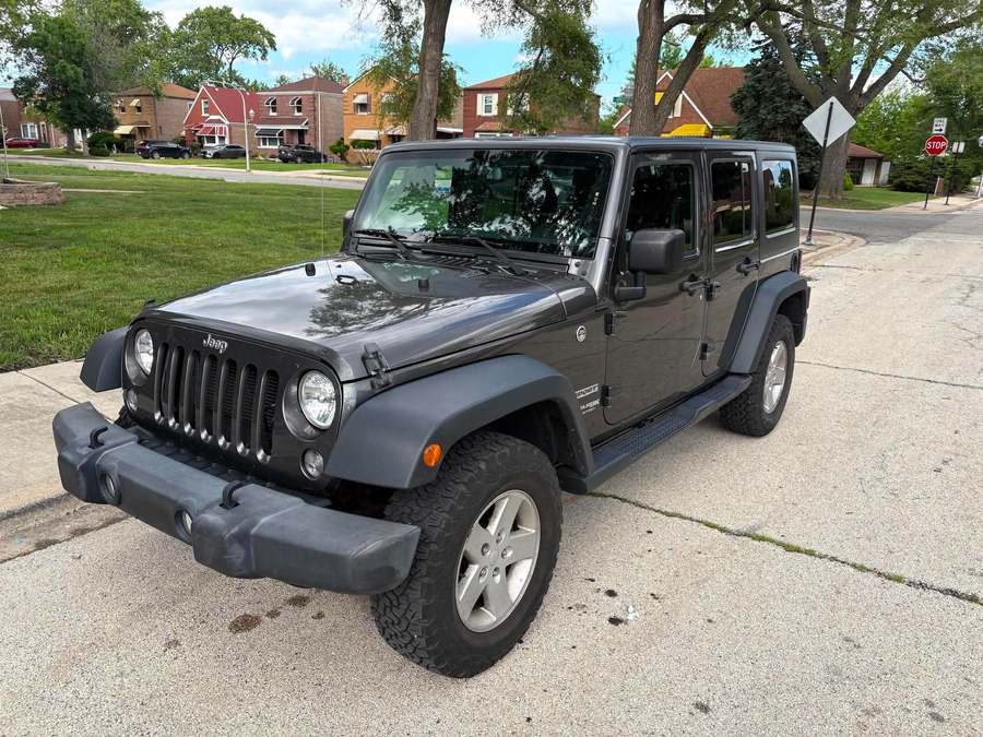 Grey Jeep Wrangler Unlimited detailed inside and out