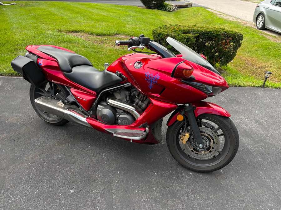 Red Honda DN-01 motorcycle detailed to a high gloss