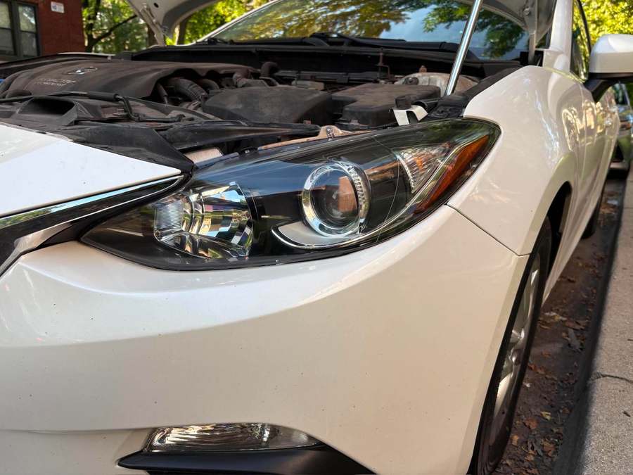 Passenger side headlight restored to clear
